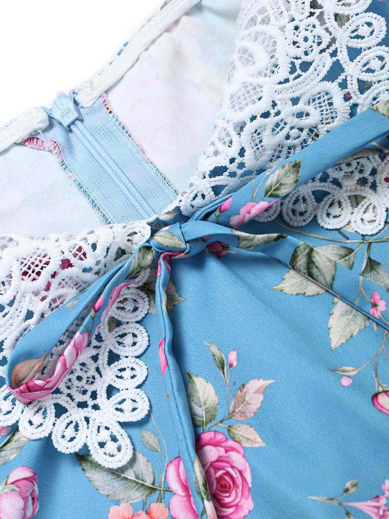 Blaues 50er ärmelloses Kleid mit Blumen und Spitzenkragen