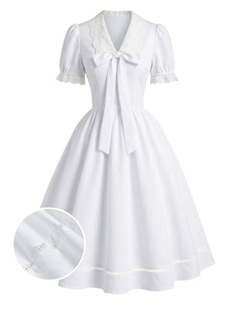 Weißes 50er Kleid mit Spitzen-Chelsea-Kragen und Schleife