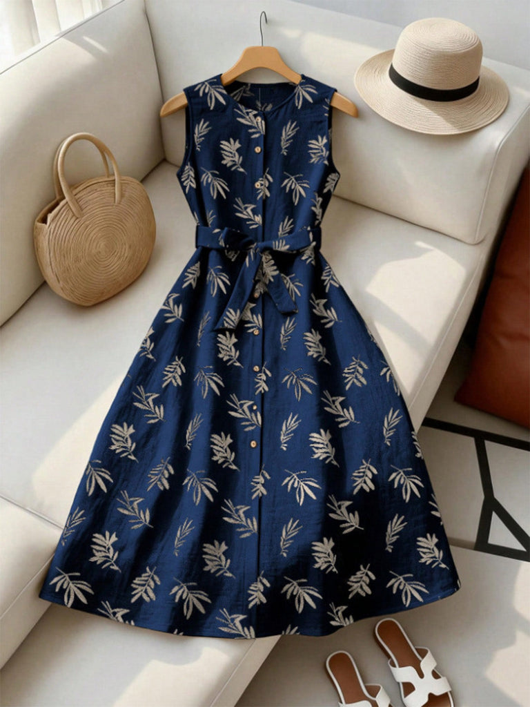 Tiefblaues 50er Kleid mit Blatt-Print und Gürtel