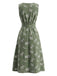 Tiefblaues 50er Kleid mit Blatt-Print und Gürtel