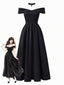 Schwarzes 70er Joker-Queen Maxikleid mit schulterfreiem Schnitt