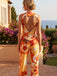 Orange 60er ärmelloser Blumen-Jumpsuit mit Herz-Cut-out am Rücken