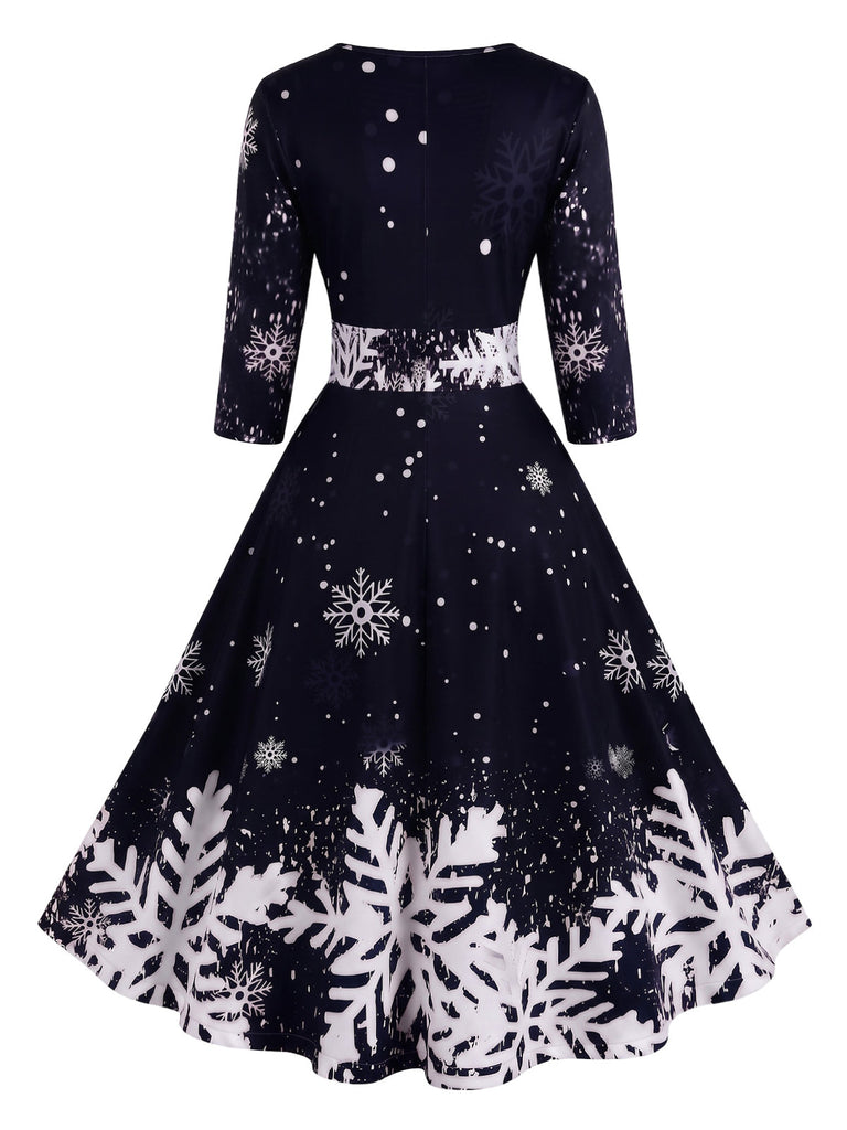 50er Schneeflocken-Printkleid mit Halbärmeln und betonter Taille
