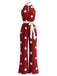 Ärmelloser 70er Neckholder-Punkte-Jumpsuit mit weitem Bein und Gürtel