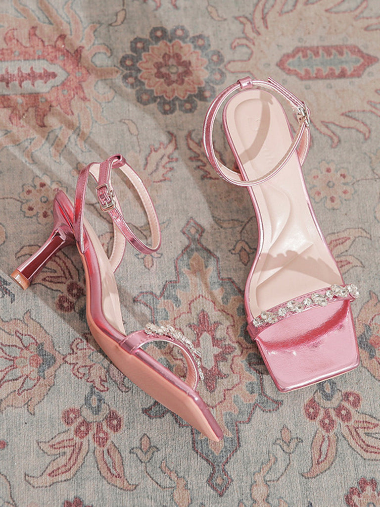 Rosa Sandalen mit Kristall und Riemen