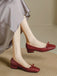 Burgunderrote Vintage Ballerinas mit Schleife und Zehen