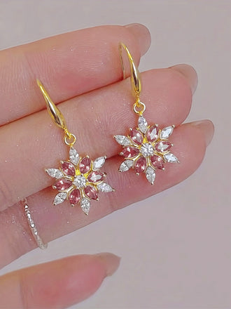 Goldene Weihnachts-Ohrhänger mit Schneeflocken
