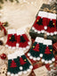 Fingerlose Weihnachts-Strickhandschuhe mit Tannenbäumen und Bommeln