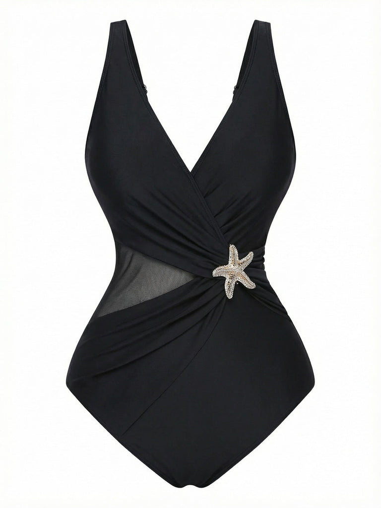 Retro-Badeanzug im Stil der 1950er Jahre mit Seesternmuster, V-Ausschnitt und Bauchweg-Technologie, ideal für einen selbstbewussten Auftritt am Strand und Pool.