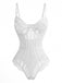 Studioaufnahme von vorne des strukturierten Bodysuits aus floraler Spitze und Mesh in strahlendem Weiß.