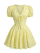 Gelbes 60er Baumwoll-Minikleid mit Puffärmel und V-Ausschnitt
