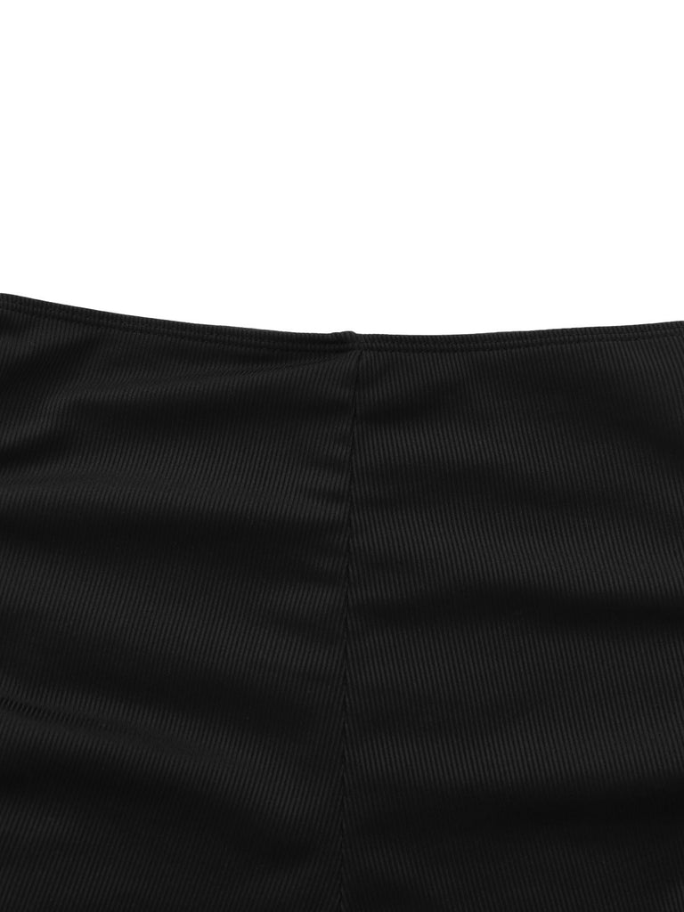 Nahaufnahme einer schwarzen Stoffstruktur auf weißem Hintergrund