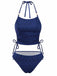 Vorderansicht des marineblauen Glitzer-Tankini-Sets mit verstellbaren Neckholder-Trägern und gerafftem Oberteil.