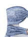 Detailansicht des Seitenprofils, die den Acid-Wash-Denim-Print-Effekt und die Naht entlang des Ausschnitts zeigt.