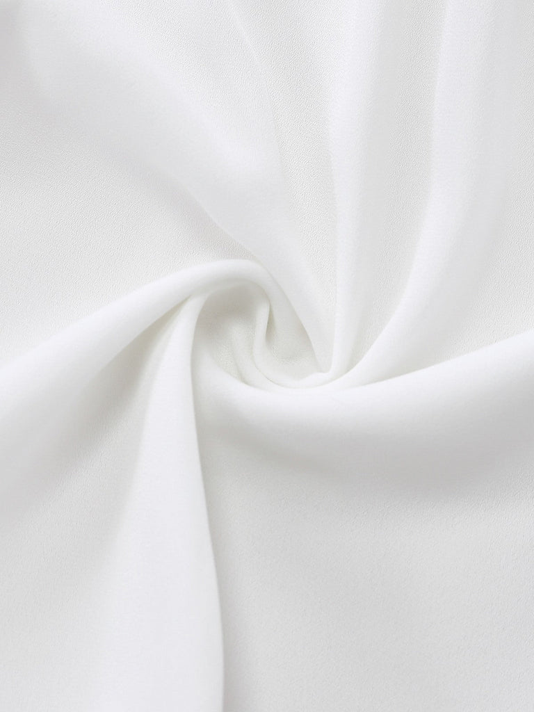 Nahaufnahme von weißem Stoff mit Falten