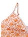 Weißes Bikini-Oberteil mit orangefarbenem Blumenmuster auf weißem Hintergrund