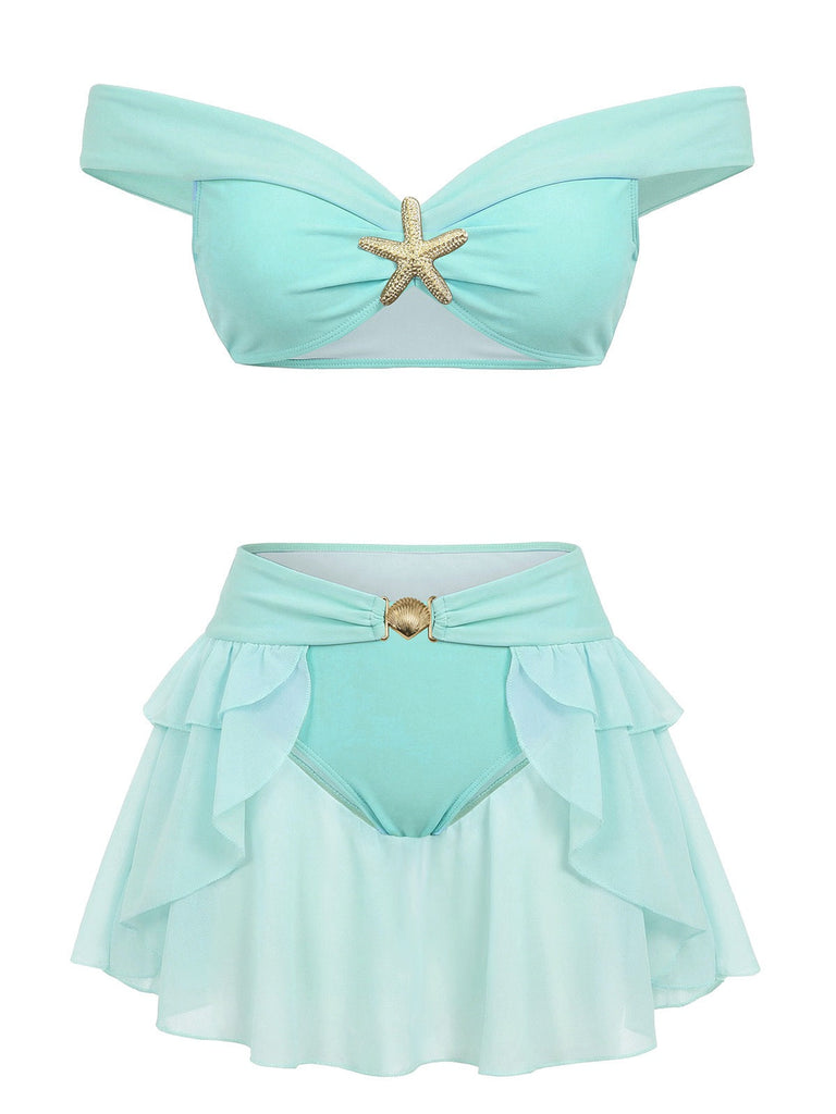 Retro-Bikini im Stil der 1970er-Jahre: Türkisfarben, schulterfrei, mit prinzessinnenhaften Rüschen und Boho-Design – ideal für sommerliche Strandurlaube und Resort-Aufenthalte.