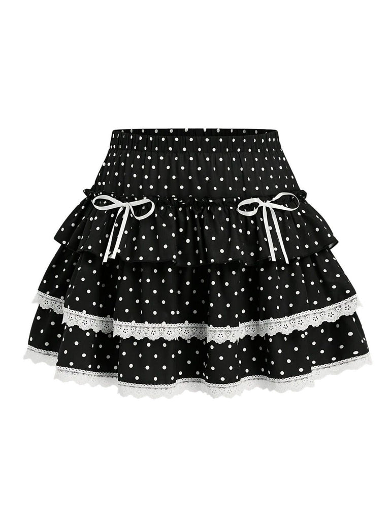 Schwarzer Minirock mit Polka-Dots und gestuften Rüschen, Vorderansicht – perfekt für einen Vintage-inspirierten und romantischen Stil.