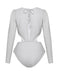 Rückansicht des silberglänzenden Bodysuits, die den eleganten Schnürverschluss und das offene Rückendesign hervorhebt.